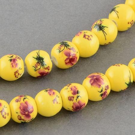 Porseleinen kralen, 8mm, geel met bloem. Verkocht per streng van ca. 40 cm (50 kralen)