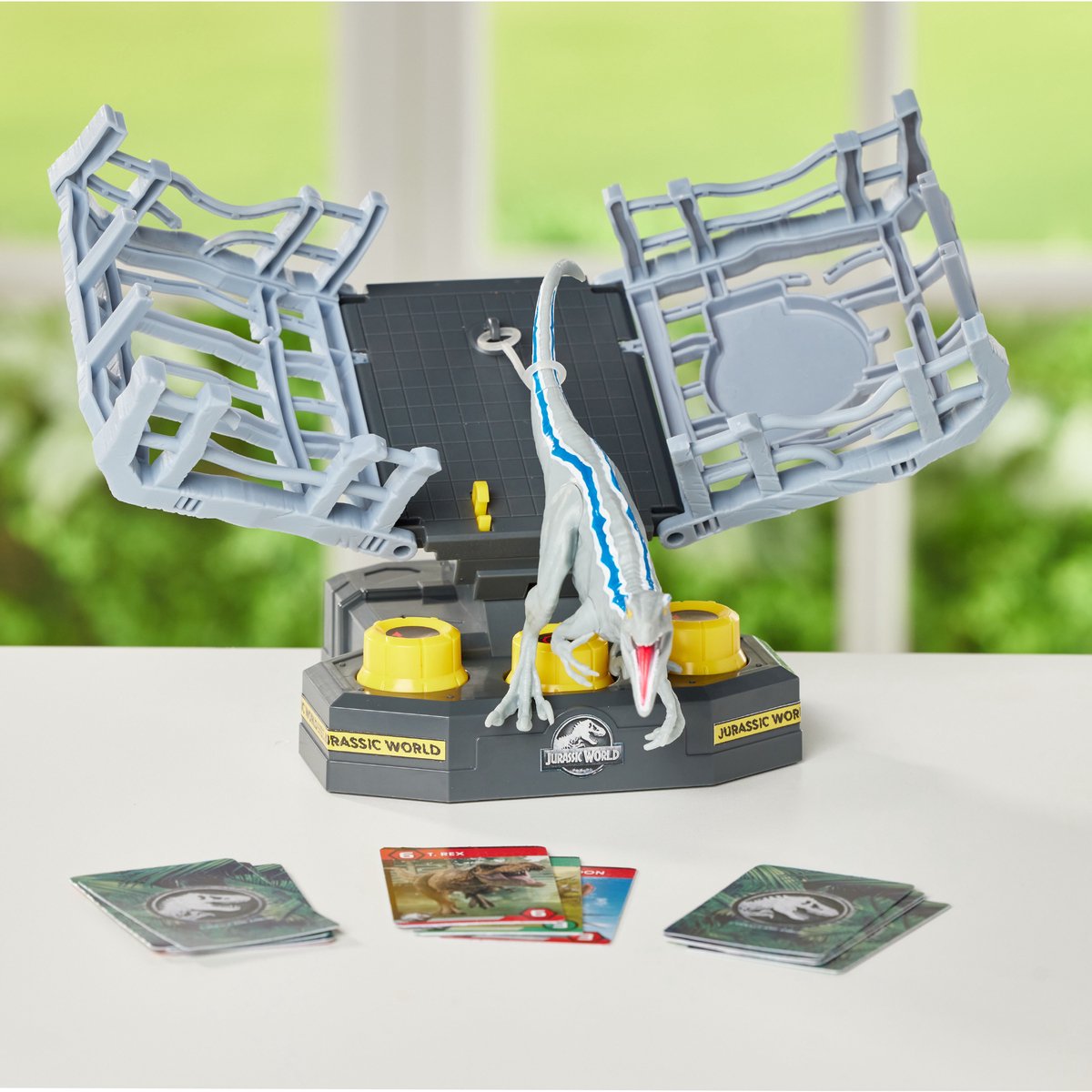 Epoch Jurassic World spel Cage Breaker - Velociraptor avontuur.