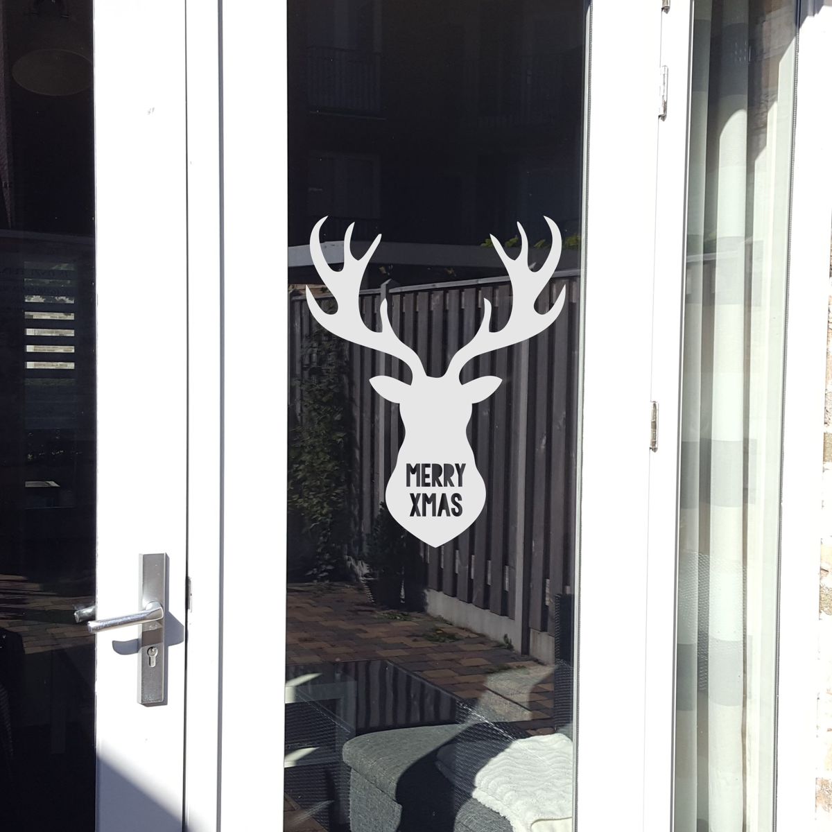 Statische raamsticker Merry XMAS - rendier- HERBRUIKBAAR