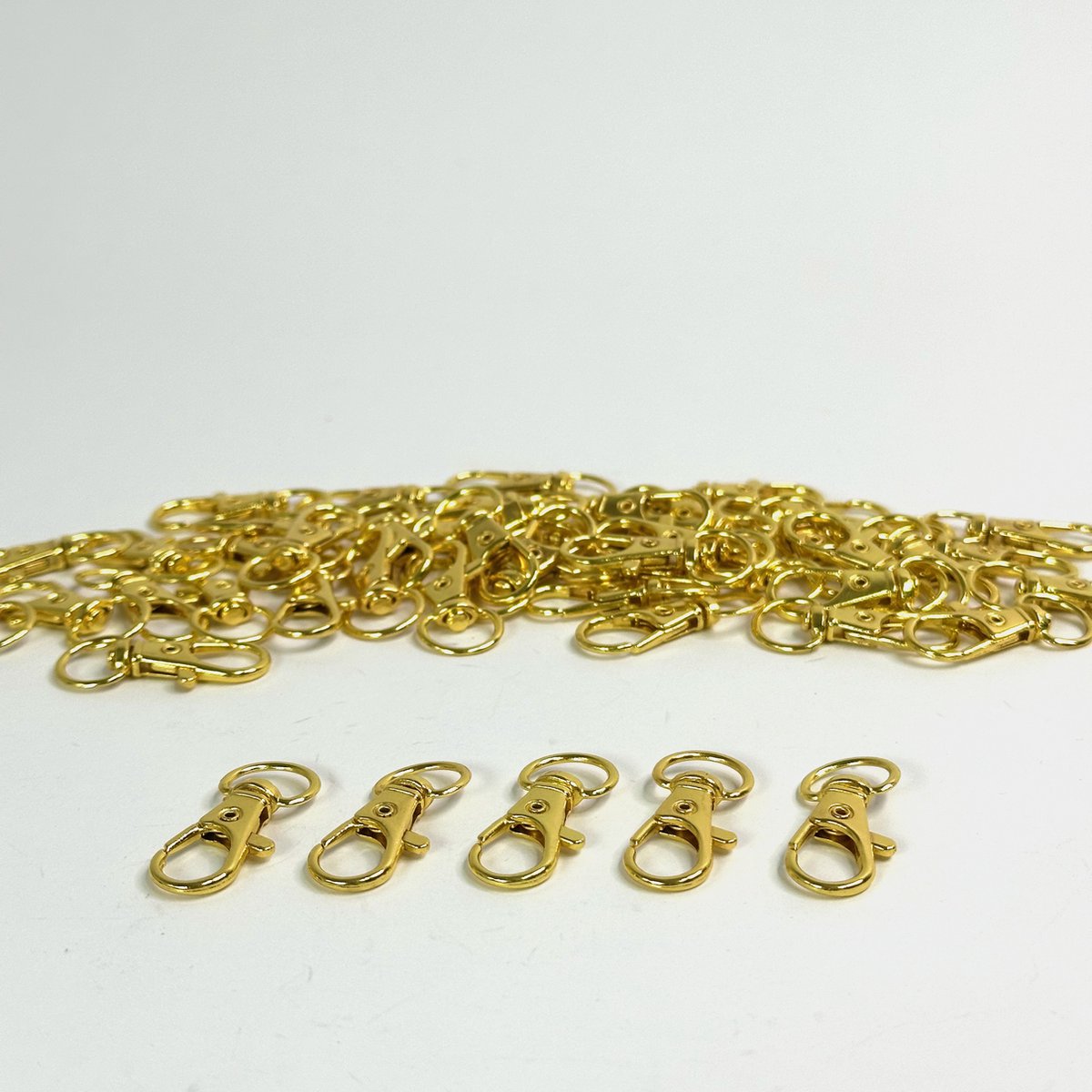 MGM Trading - Gouden Metalen Mini Swivel Kreeftsluitingen - 50 Stuks - 33 mm Lang - Premium Lanyard Haken - Geschikt voor Ringen - Ritsen - Hobby - Sieraden - Kettingen - Sleutelhangers