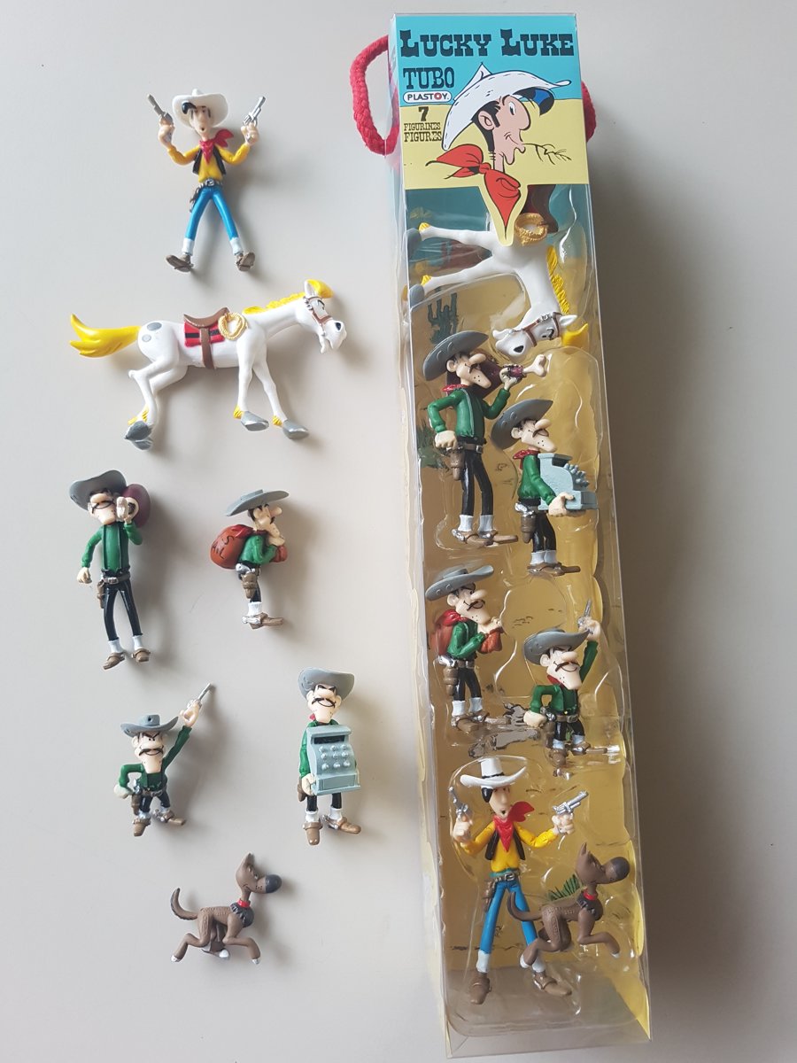 Tube met 7 figuren Lucky Luke en de Daltons