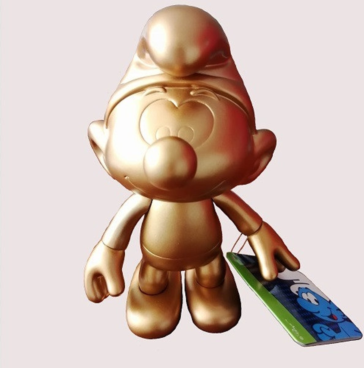 bronskleurige beweegbare smurf (20 cm).