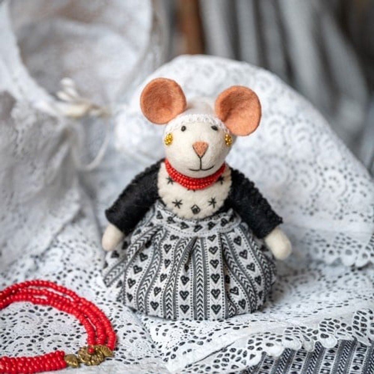 Sjaal met verhaal Zeeuws meisje / muisje