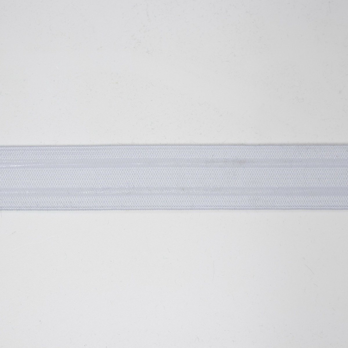 Textielstad Fournituren Banden - Anti slip elastiek 25mm wit - Fournituren elastieken band - Wit - 1 meter