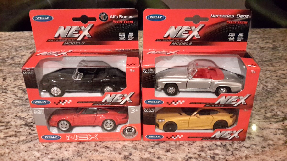 Welly Nex autos 1:43 opening Doors pull back go